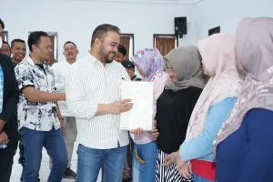 70 Sertifikat PTSL Diserahkan, Heli Suyanto Pastikan Warga Bulukerto Dapat Kepastian Hukum